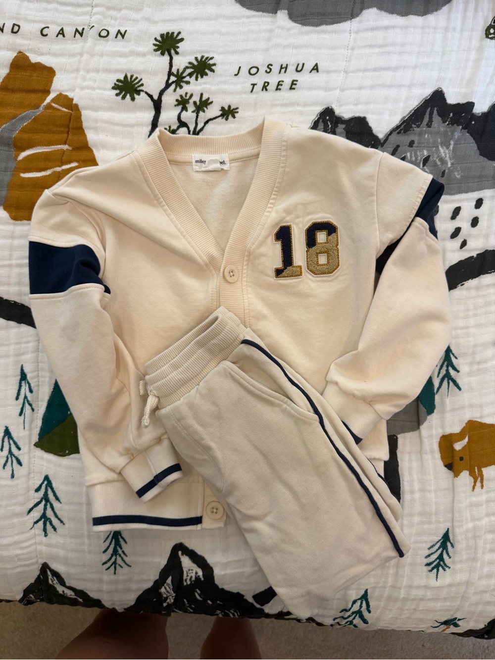 Miley & Co. Kids Cream Sweatshirt & Jogger Set with Navy Trim - 18 Patch